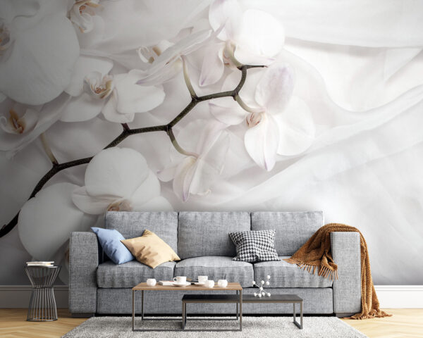 Orchidee bianche su tessuto bianco Orchidee bianche su tessuto bianco
