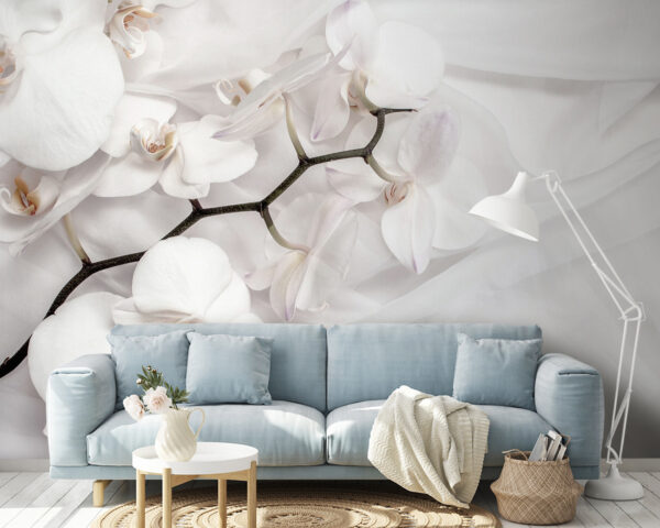 Orchidee bianche su tessuto bianco Orchidee bianche su tessuto bianco