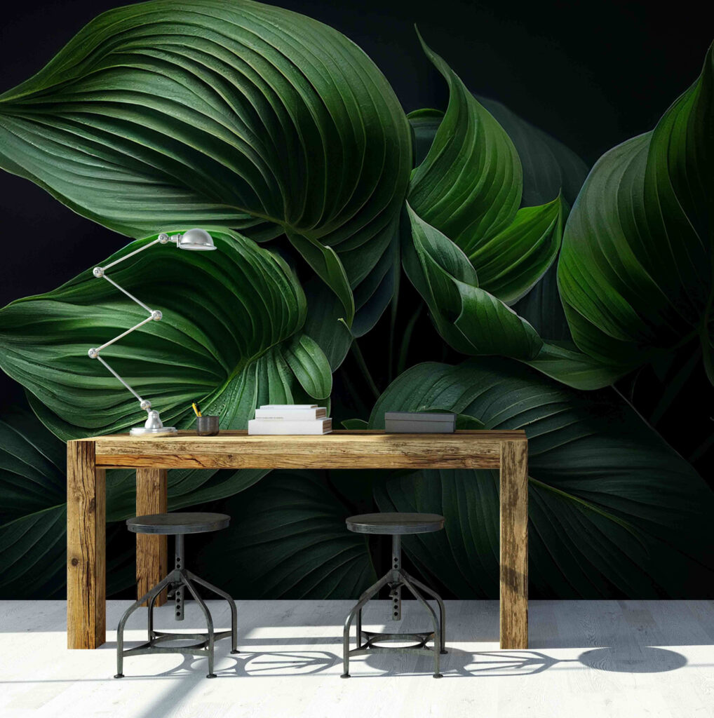 Lush green leaves in serene darkness