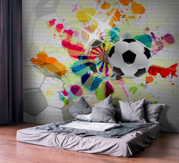 Pallone da calcio su un muro di mattoni Pallone da calcio su un muro di mattoni