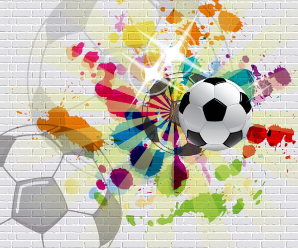 Pallone da calcio su un muro di mattoni Pallone da calcio su un muro di mattoni