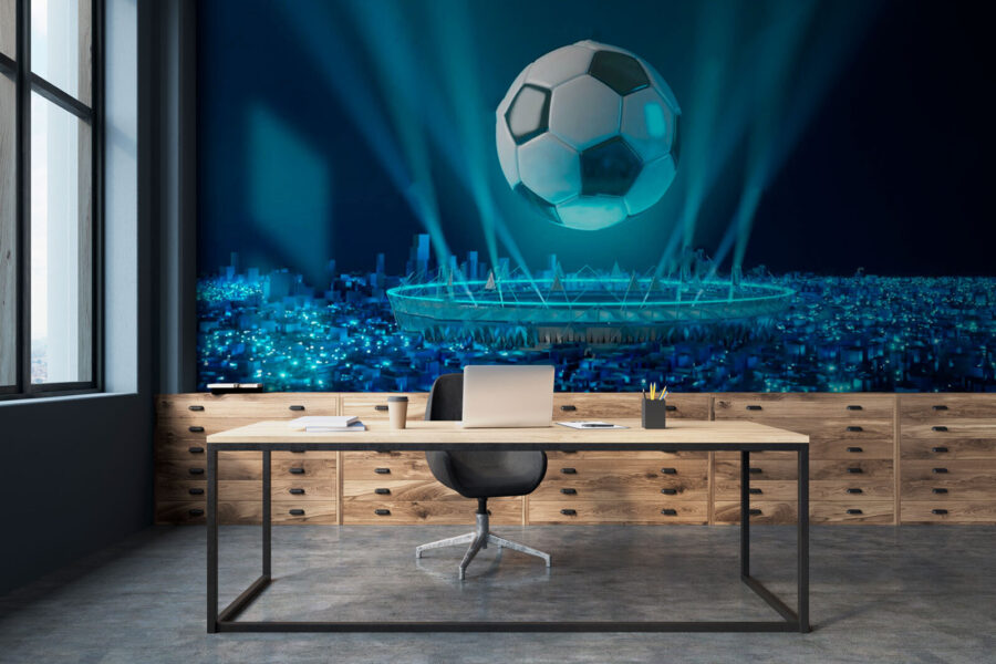 Pallone da calcio sopra uno stadio