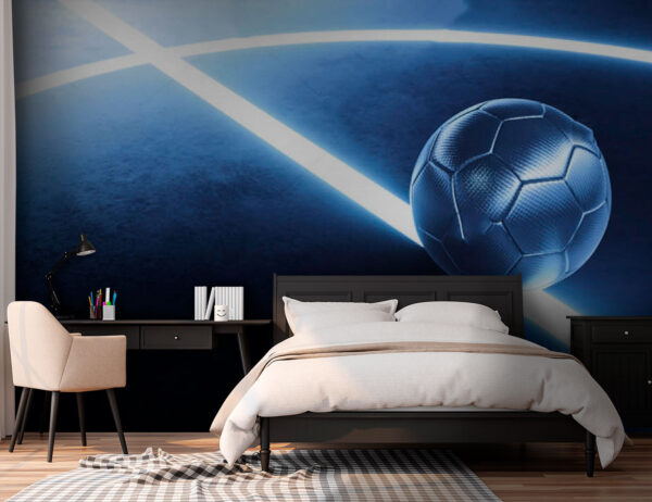 Pallone da calcio su una superficie blu Pallone da calcio su una superficie blu