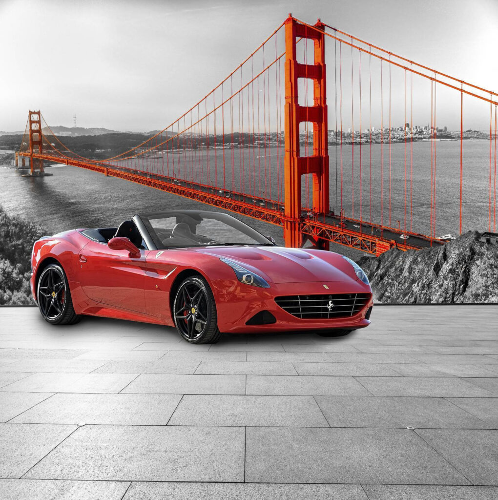 Auto sportiva rossa su una strada con un ponte sullo sfondo Auto sportiva rossa su una strada con un ponte sullo sfondo