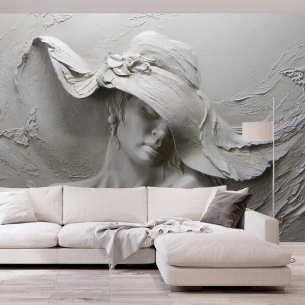 Scultura di donna con cappello Scultura di donna con cappello