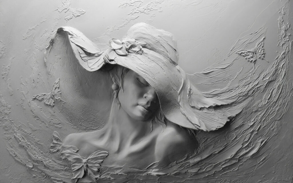 Scultura di donna con cappello Scultura di donna con cappello