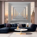 Carta da parati Lunga passerella con pilastri e città sullo sfondo