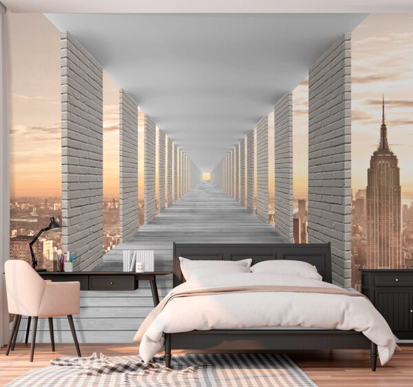 Long walkway with pillars and a city in the background Long walkway with pillars and a city in the background