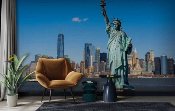 Statua della libertà con una città sullo sfondo Statua della libertà con una città sullo sfondo