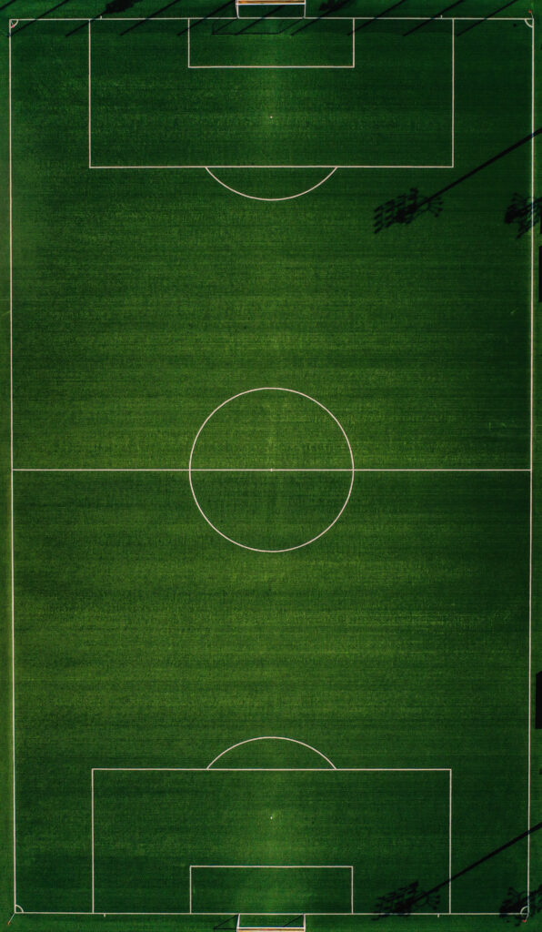 Campo da calcio con cerchio bianco Campo da calcio con cerchio bianco