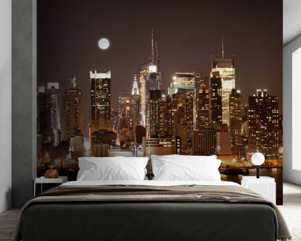 Lo skyline della città di notte con la luna in cielo Lo skyline della città di notte con la luna in cielo