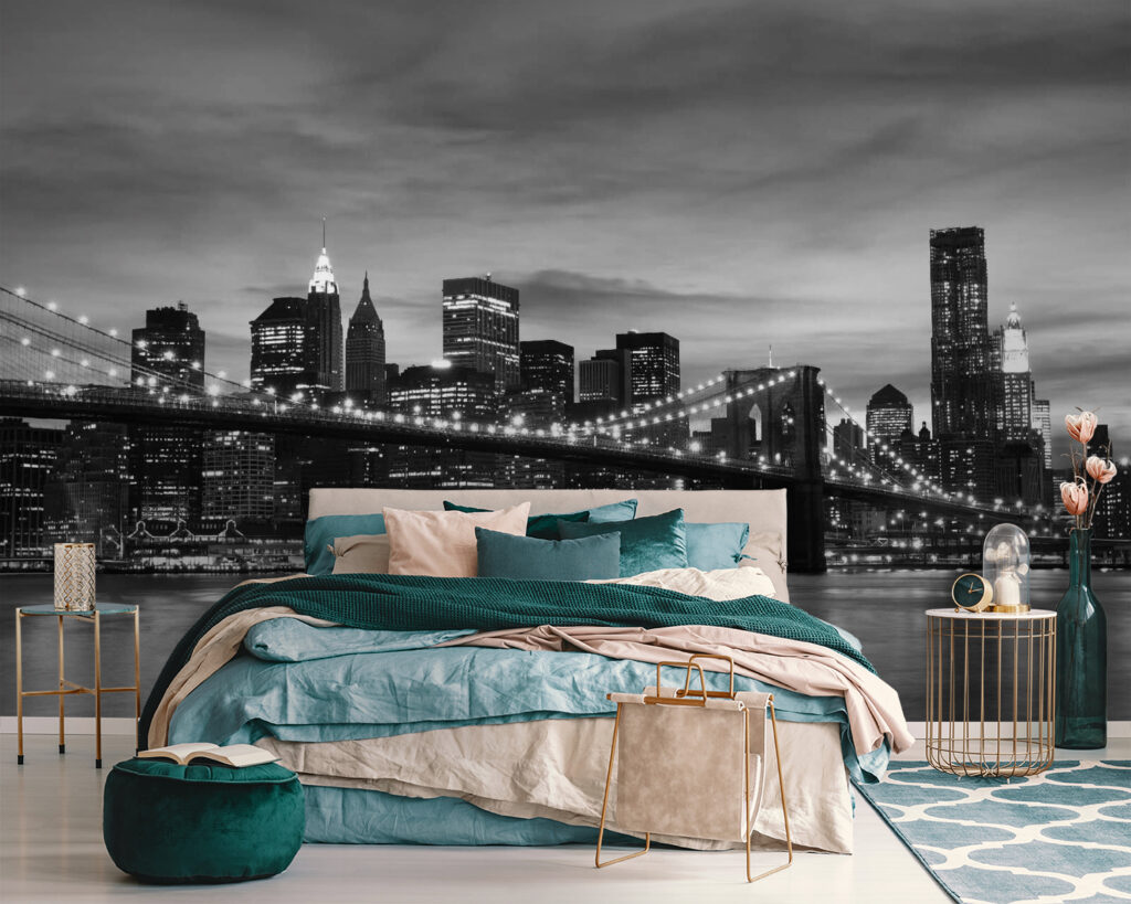 Bridge over water with city skyline in the background