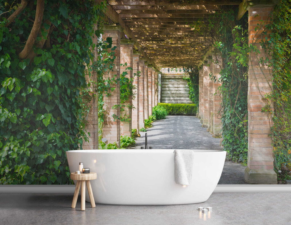 Walkway with stone pillars and vines