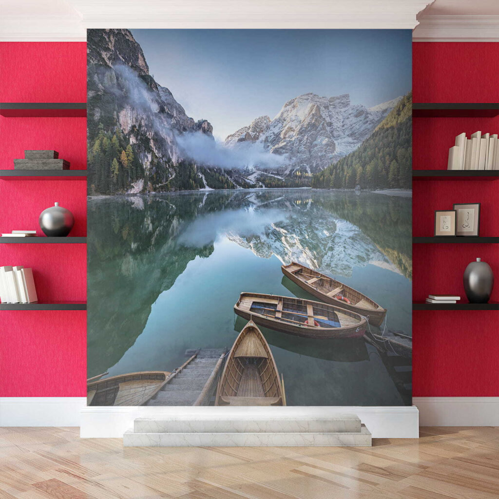 Boats on a lake with mountains in the background Boats on a lake with mountains in the background