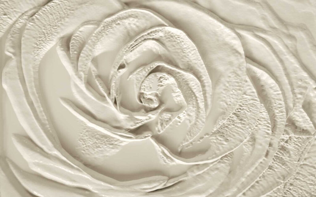 Superficie strutturata di colore bianco con volute Superficie strutturata di colore bianco con volute