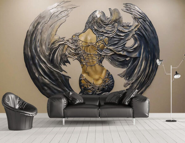 Scultura in metallo di una donna con le ali Scultura in metallo di una donna con le ali