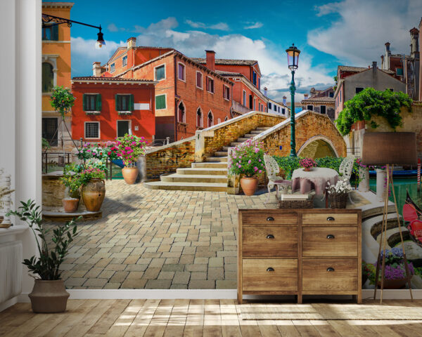 Patio con tavolo e sedie e fontana di fronte a un edificio Patio con tavolo e sedie e fontana di fronte a un edificio