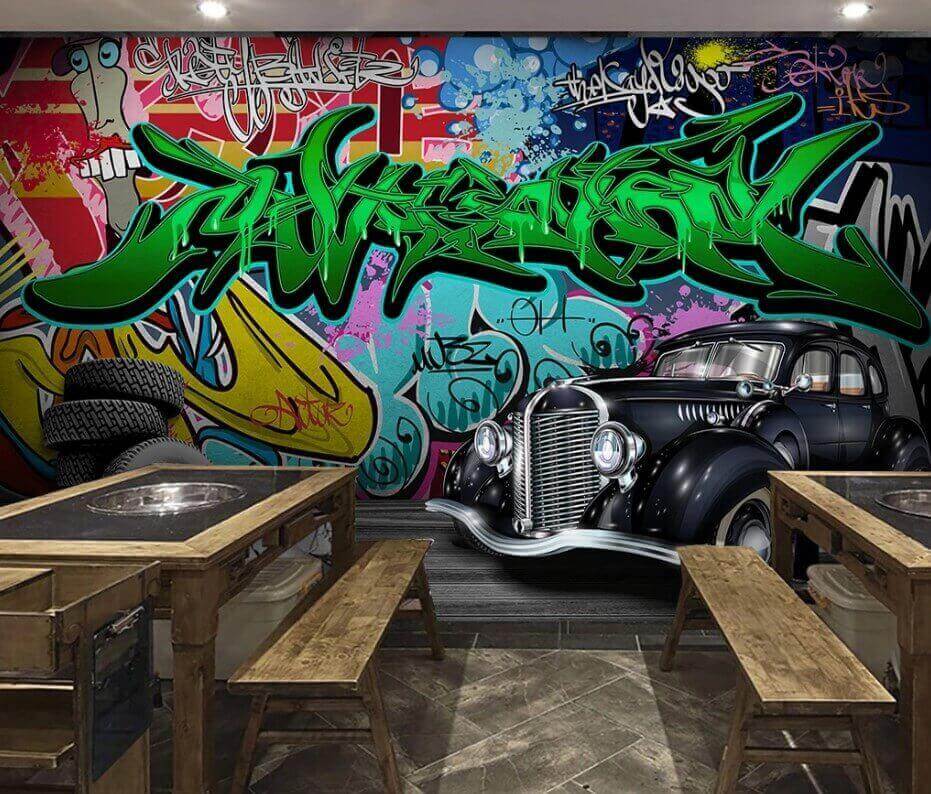 Auto nera con ruote davanti a un muro colorato u01706piz1m - Auto nera con ruote davanti a un muro colorato - tegory