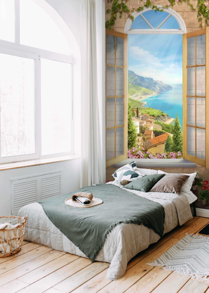 Window with a view of a town and a body of water