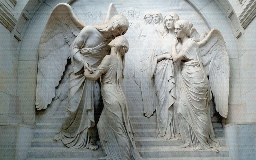 Statua di un uomo che bacia una donna Statua di un uomo che bacia una donna