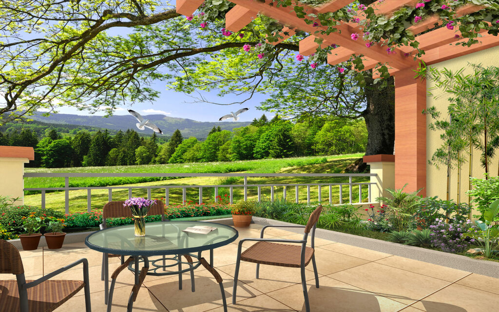 Patio con tavolo e sedie e vista su un campo verde Patio con tavolo e sedie e vista su un campo verde