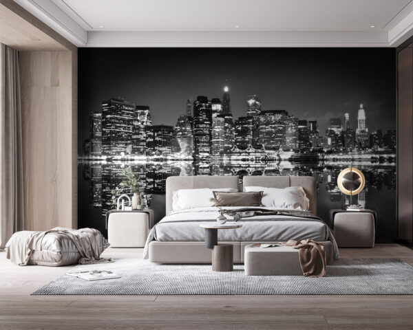 Lo skyline della città di notte con le luci che si riflettono sull'acqua Lo skyline della città di notte con le luci che si riflettono sull'acqua
