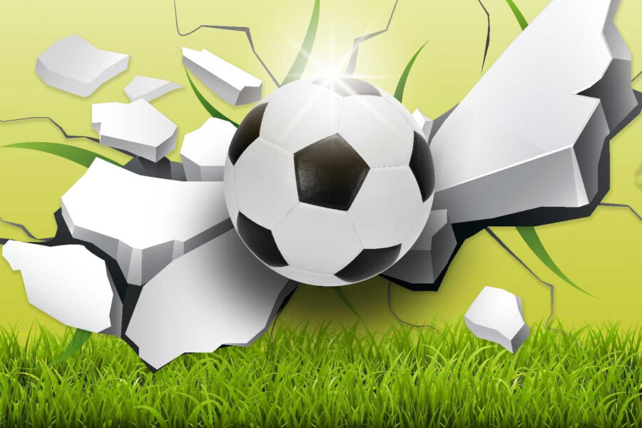 Pallone da calcio che sfonda un muro