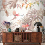 Carta da parati Gruppo di uccelli su un ramo circondato da piante tropicali