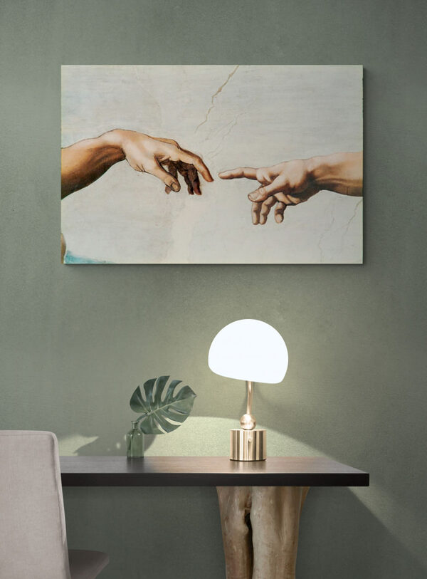 A painting of hands touching each other