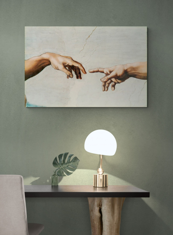 A painting of hands touching each other
