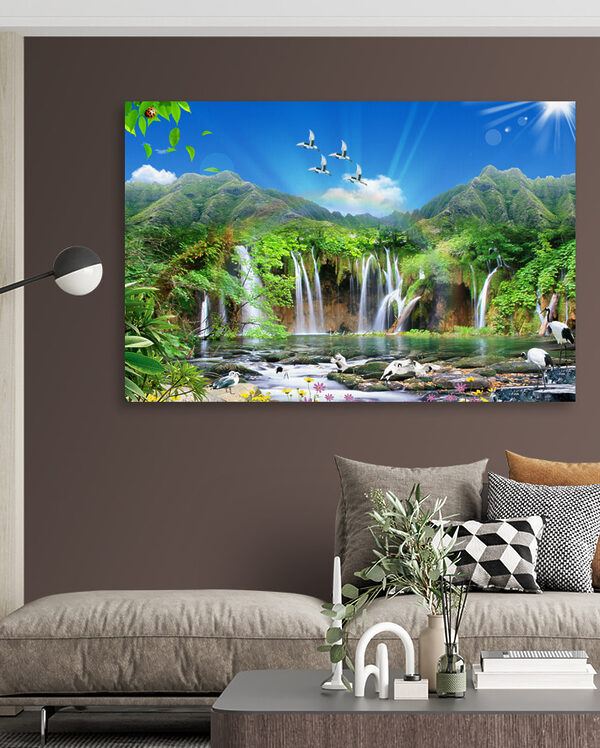 A waterfall with birds flying over it