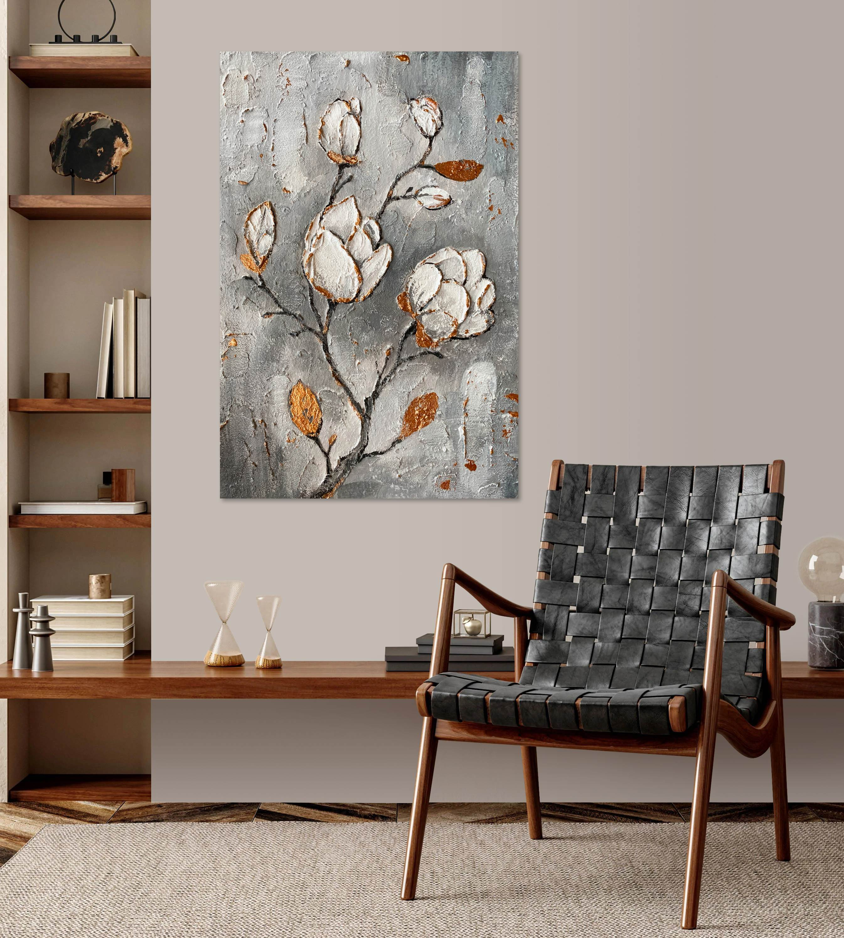 A painting of flowers on a wall