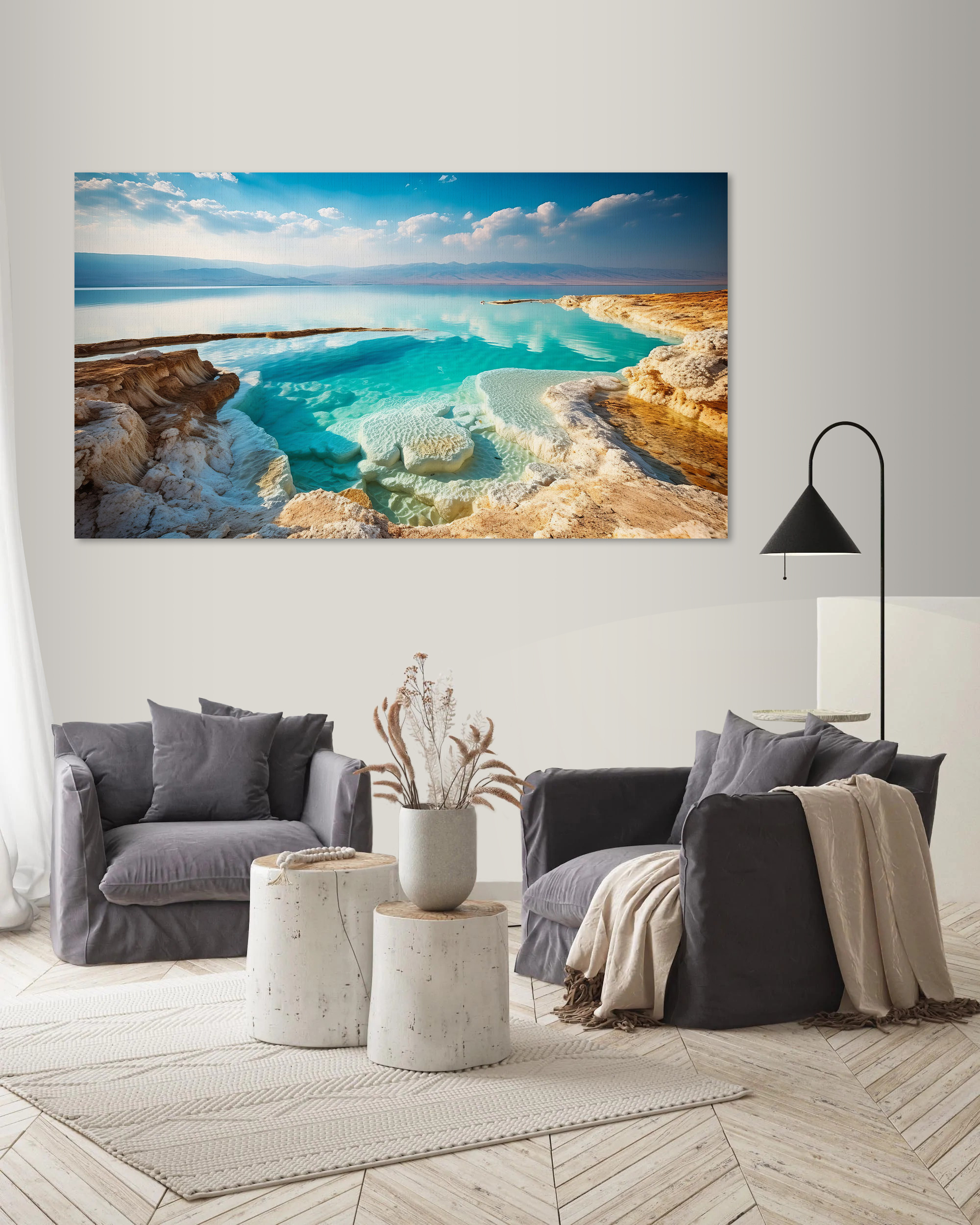 A body of water with rocks and blue sky