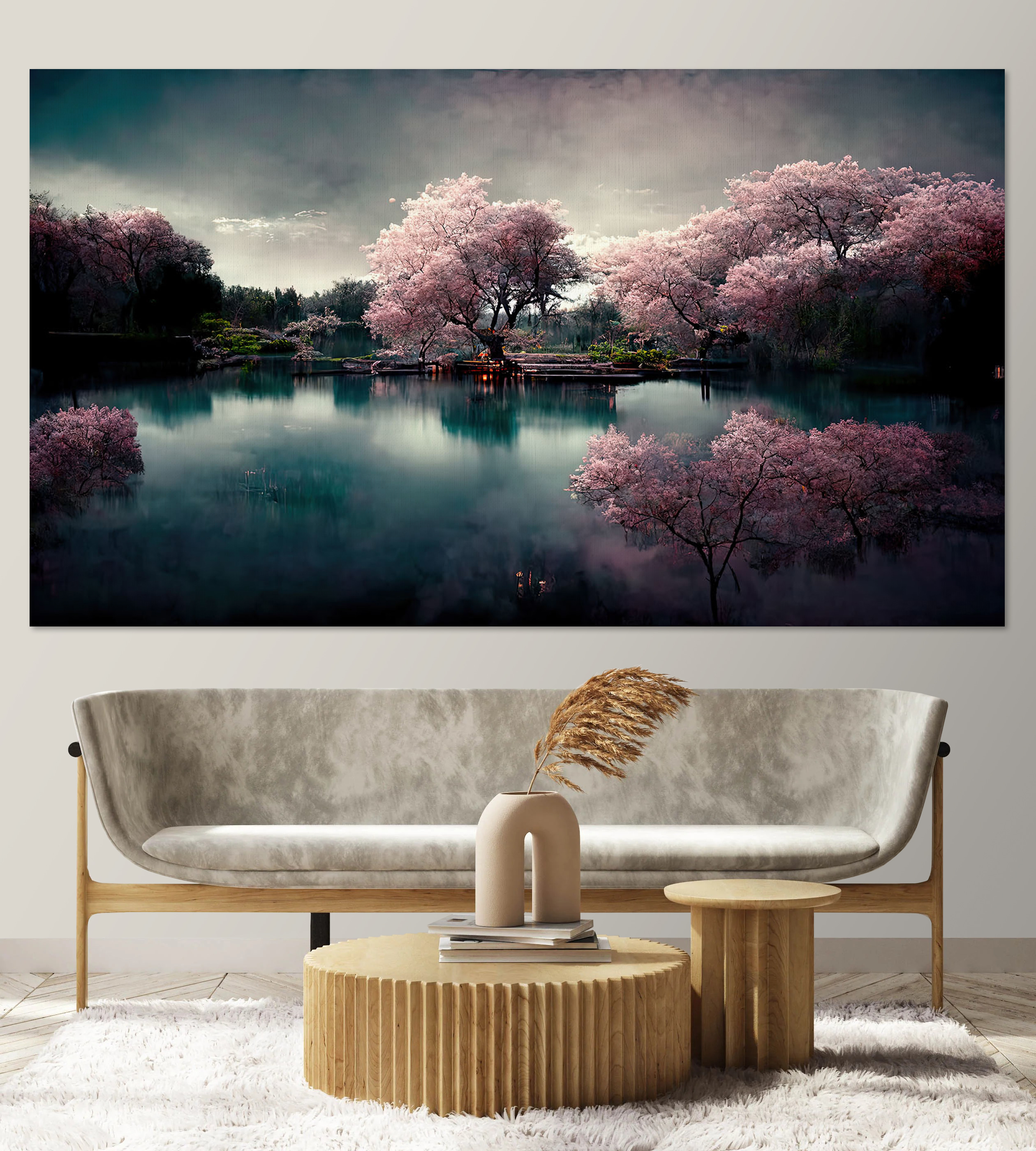 A group of trees with pink flowers on a lake