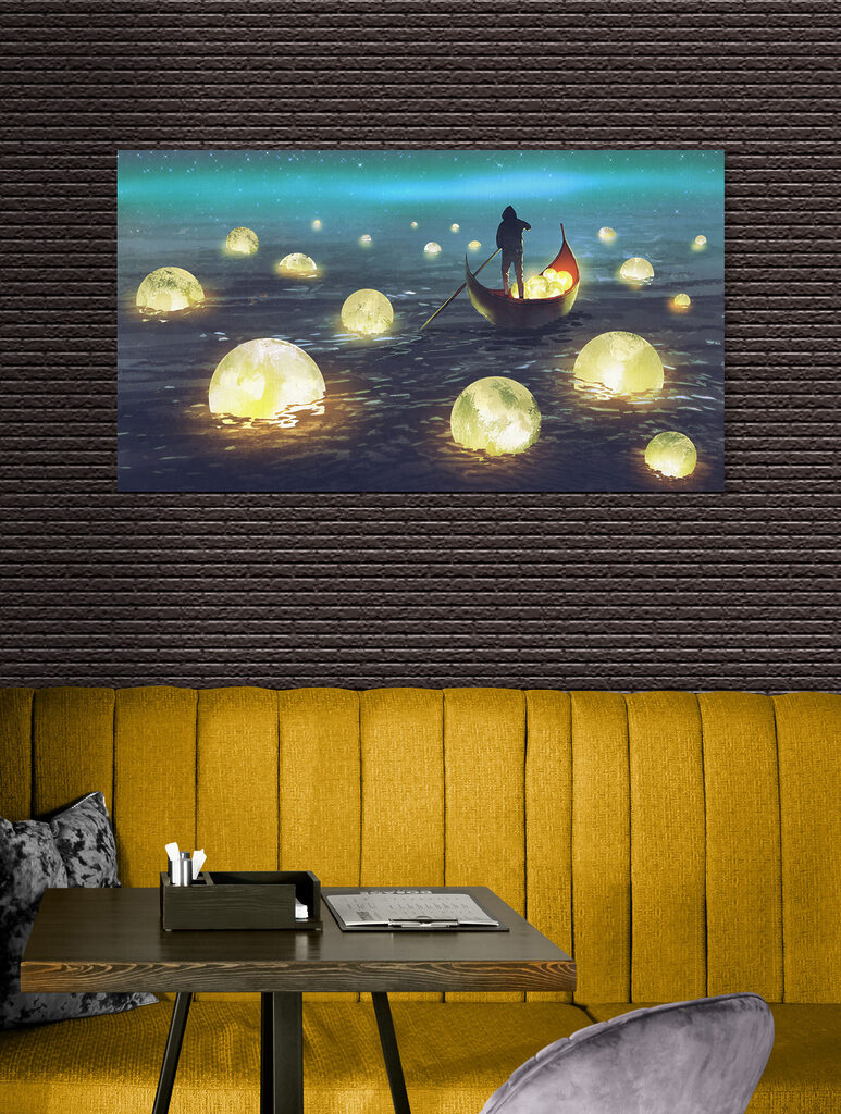 A person in a boat with glowing balls floating in the water