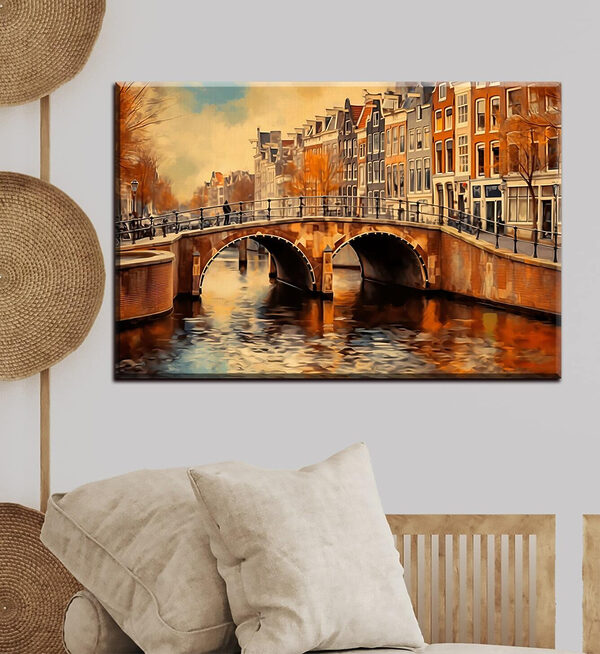 A bridge over a river with buildings in the background