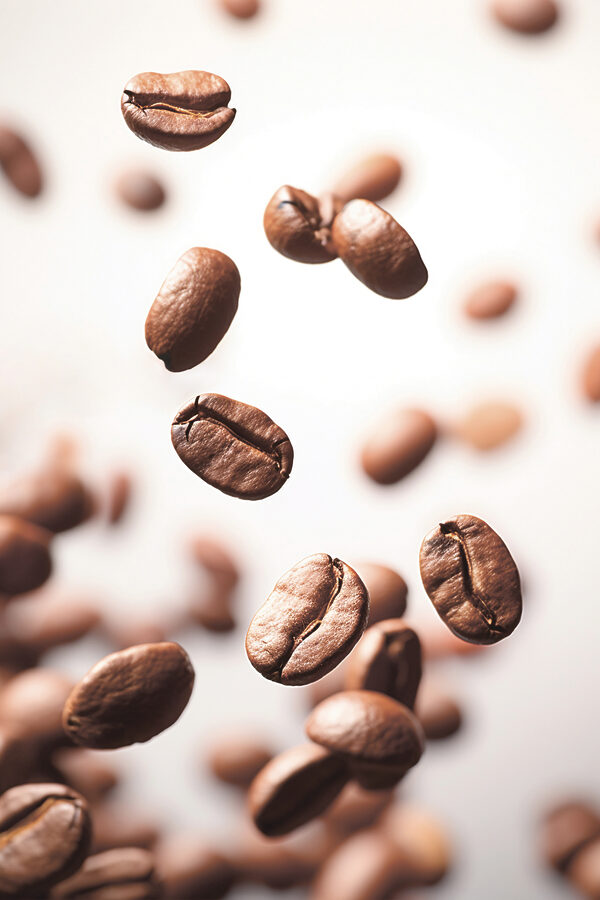 Coffee beans falling in the air