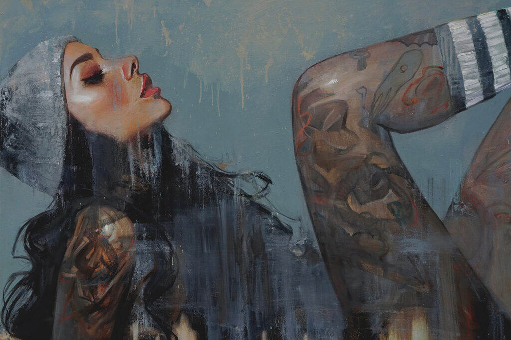 A woman with tattoos on her arm A woman with tattoos on her arm