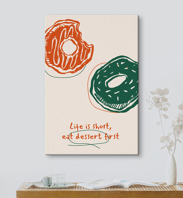 A drawing of donuts with green and orange icing A drawing of donuts with green and orange icing