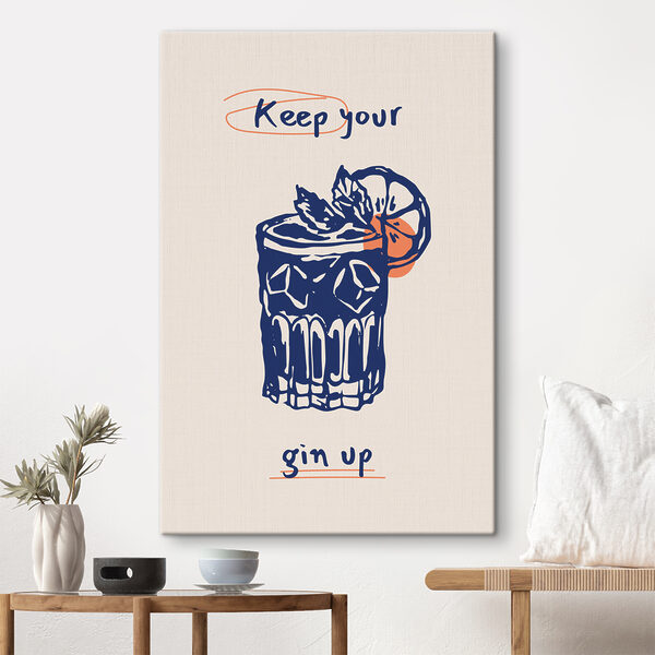 A blue and orange drink with a slice of orange and leaves A blue and orange drink with a slice of orange and leaves