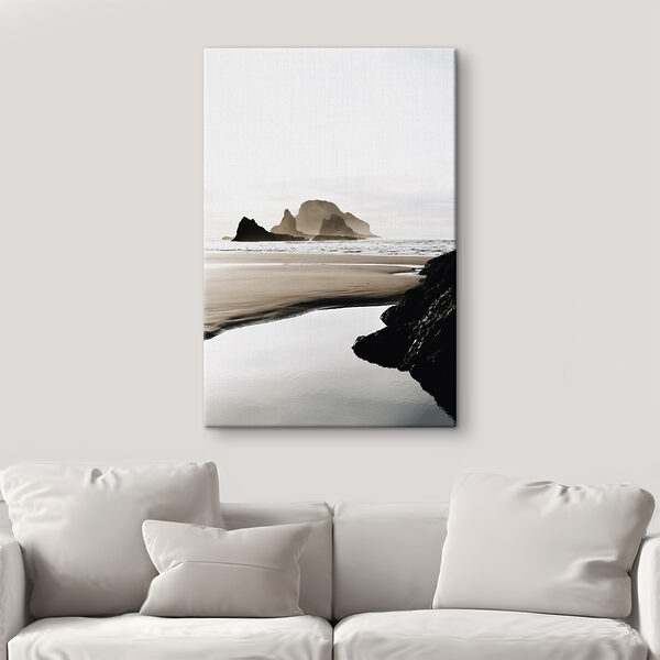A beach with rocks and water