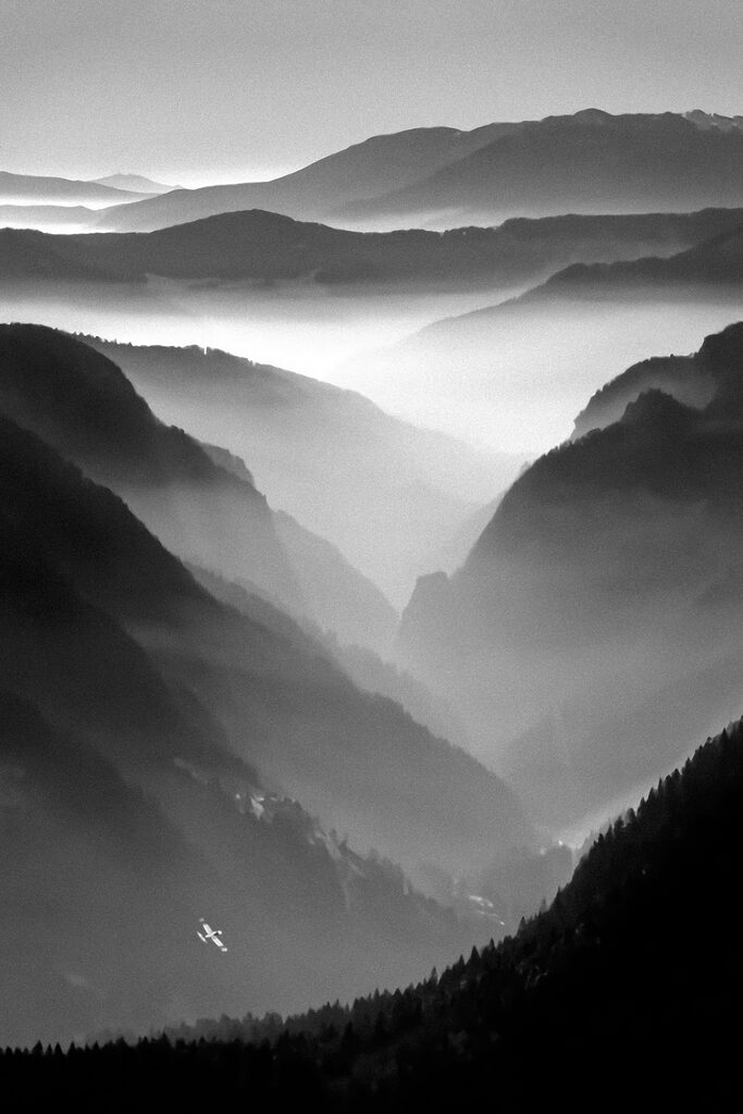 A black and white photo of mountains