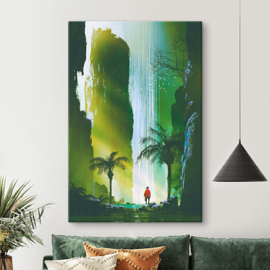 A man walking in a forest with a waterfall