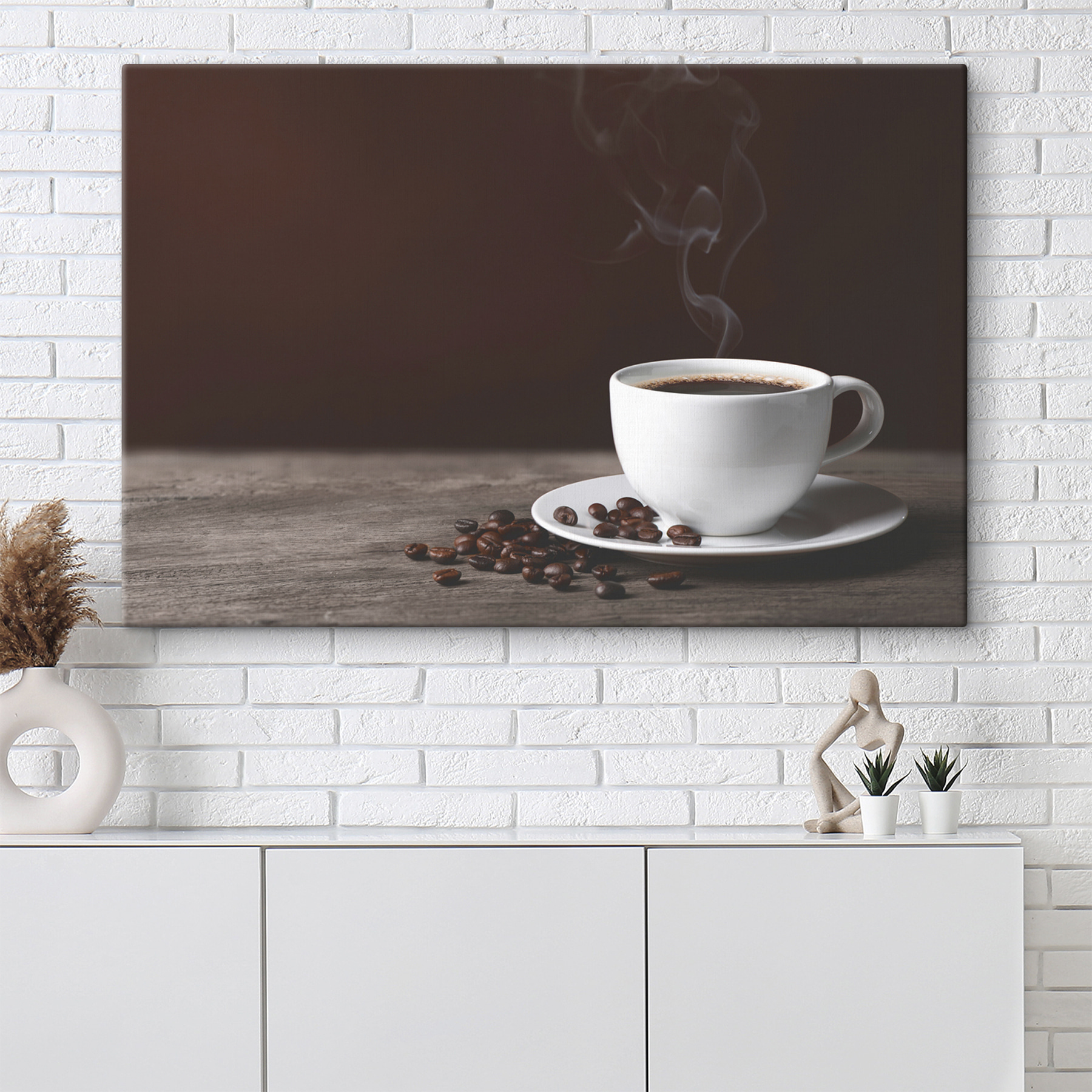 A cup of coffee with smoke and beans on a wooden surface
