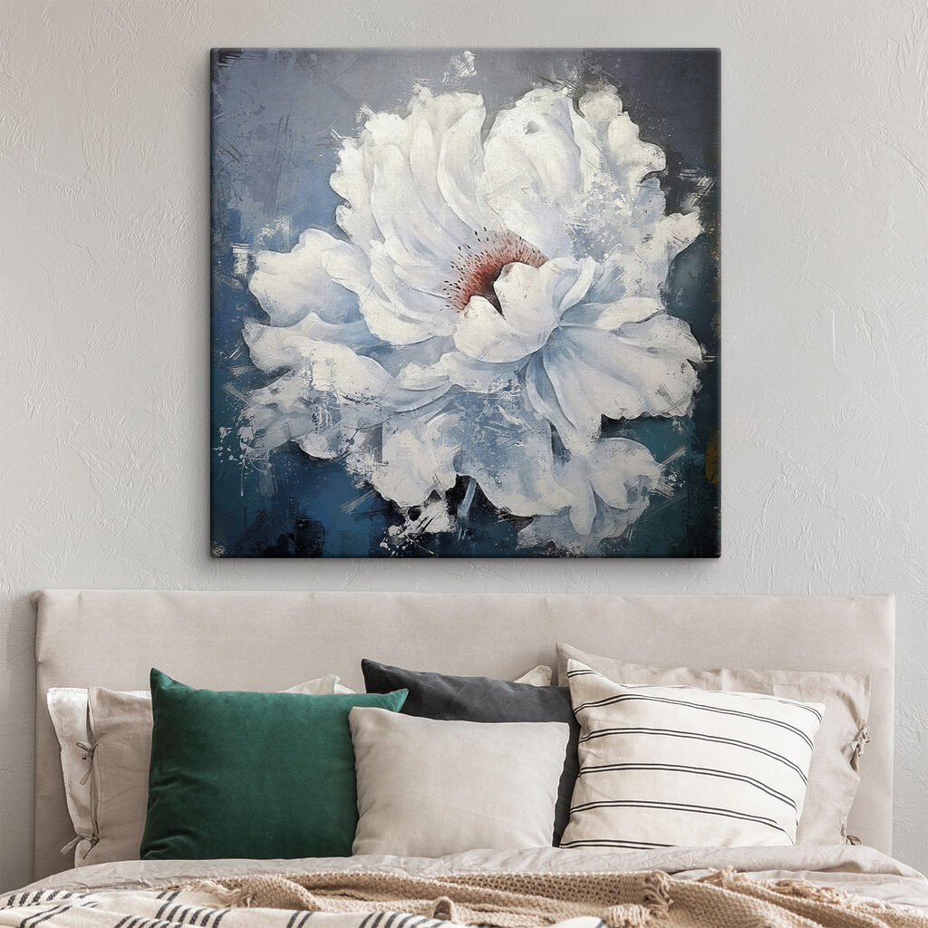 A white flower with a red center