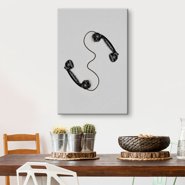 A pair of handsets with a cord A pair of handsets with a cord