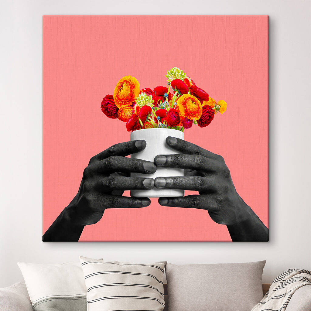 A black hands holding a white cup with flowers A black hands holding a white cup with flowers