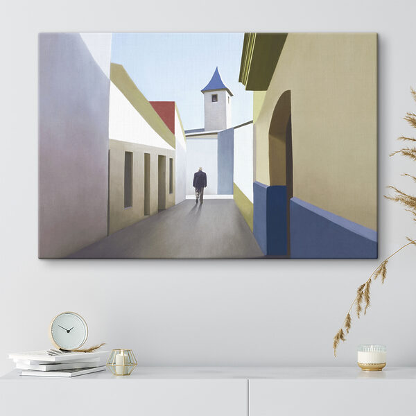 A man walking down a narrow street