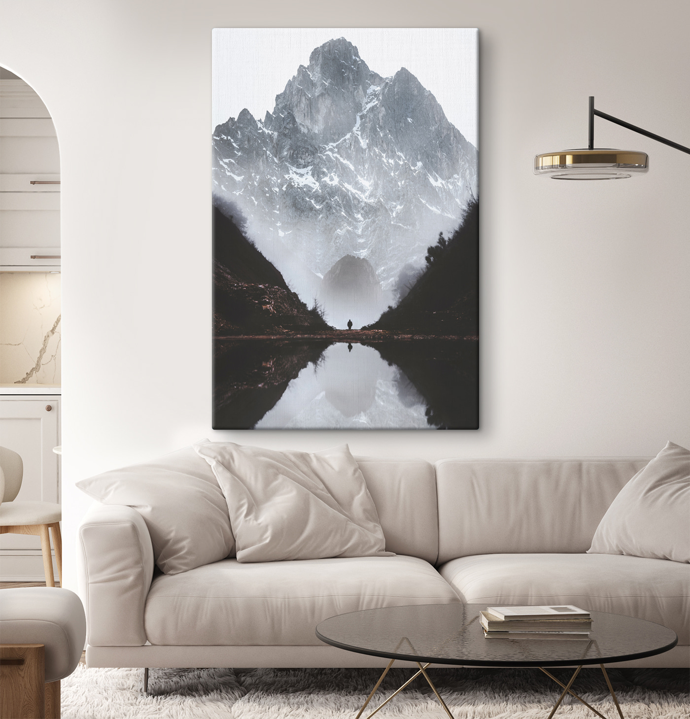 A person standing in a valley with a mountain in the background A person standing in a valley with a mountain in the background
