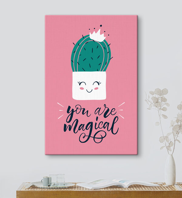 A cactus in a pot with a face and a quote A cactus in a pot with a face and a quote